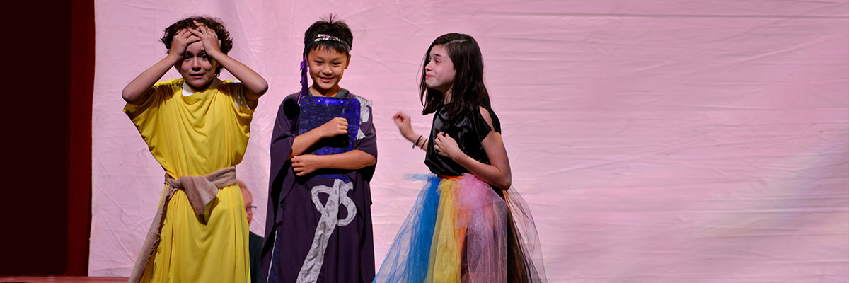 elementary school mythology campers perform