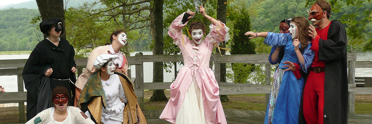 commedia troupe performing outdoors