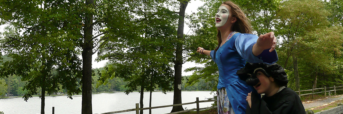 commedia actors by the river